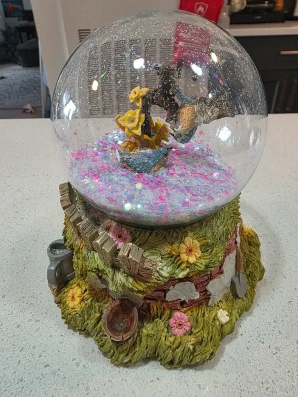 Glass and resin snow globe, Disney Bambi with forest base